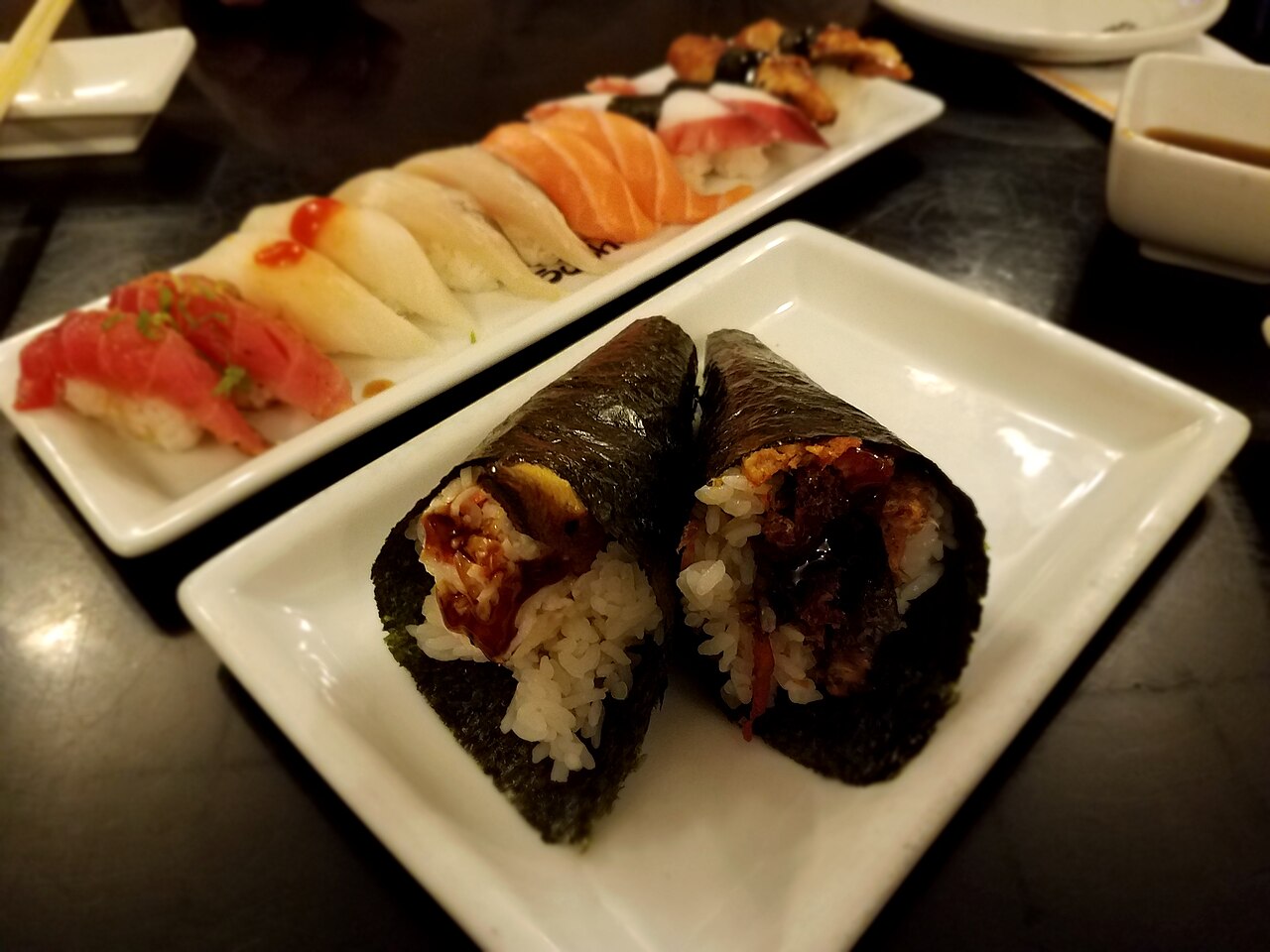 Assorted nigiri and hand-roll sushi